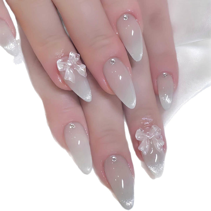 Elegant Stiletto-Shaped Press-On Nails with Decorative Bow Accents Kalsten