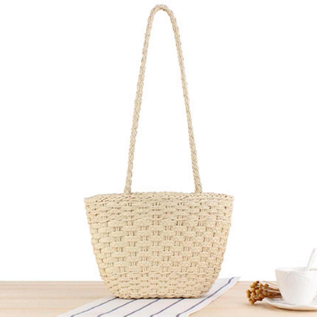 Braided handbag made of natural raffia with robust carrying straps Kalsten