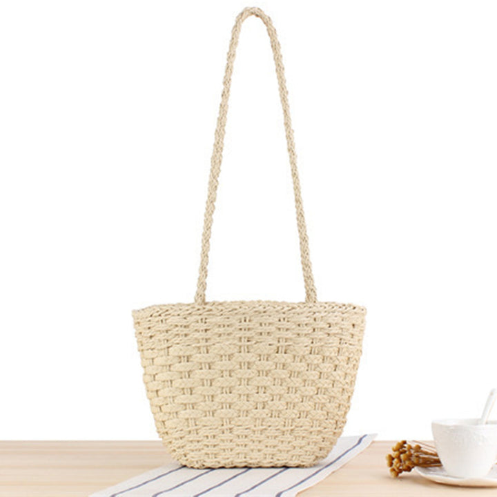 Braided handbag made of natural raffia with robust carrying straps Kalsten