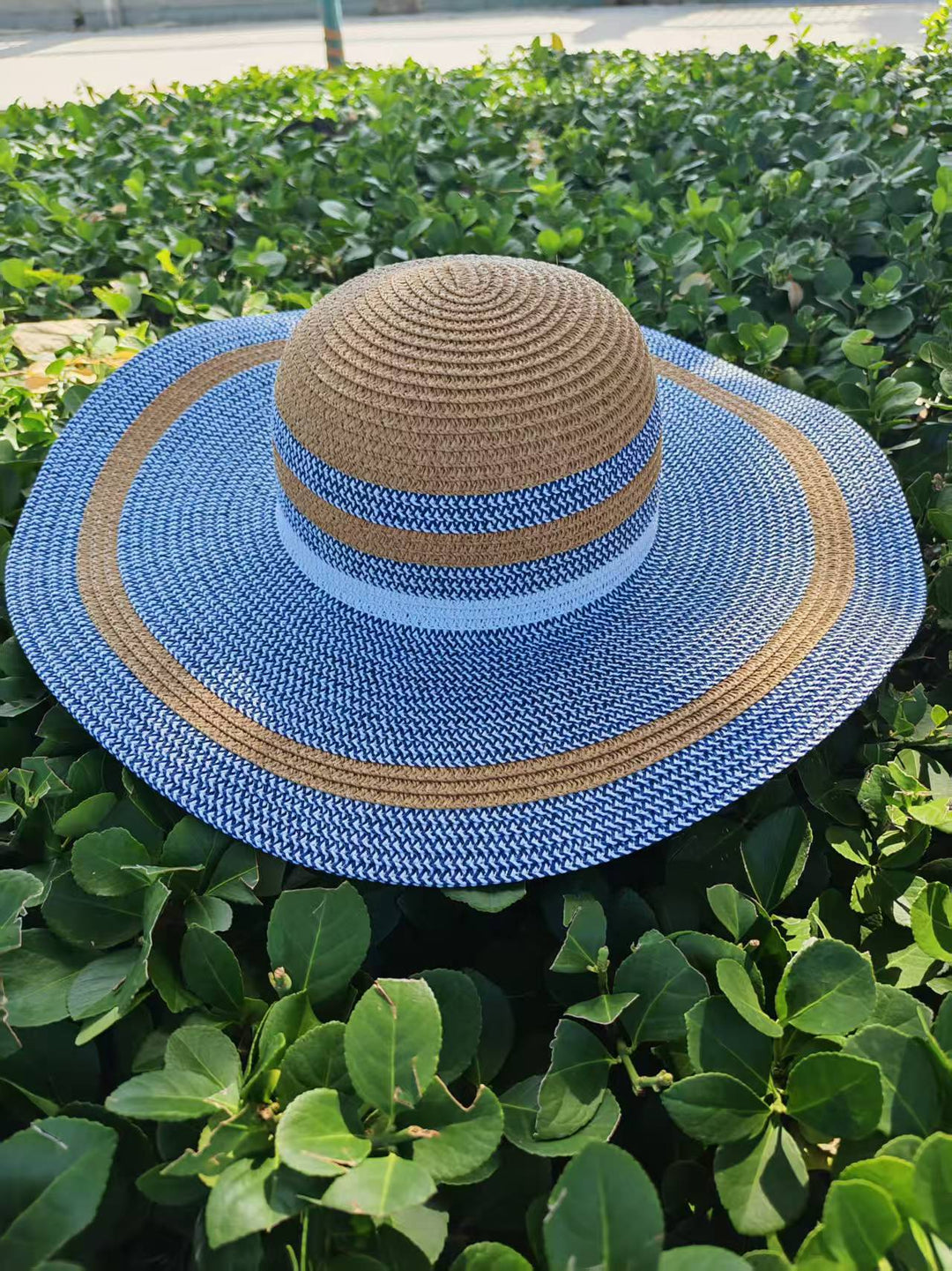 Elegant sun hat with wide brim and subtle stripe pattern Kalsten