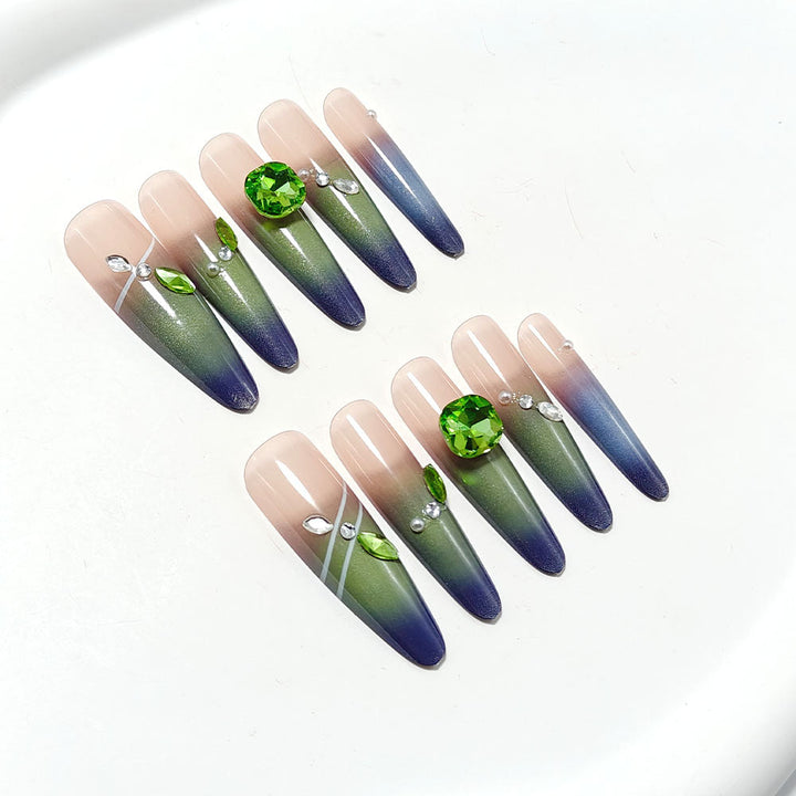Artifical nails with elegant ombre design and sparkling accents Kalsten