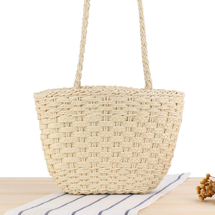 Braided handbag made of natural raffia with robust carrying straps Kalsten