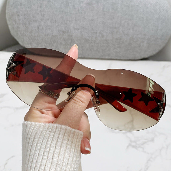 Ladies futuristic sunglasses with striking design and fashionable accents Kalsten