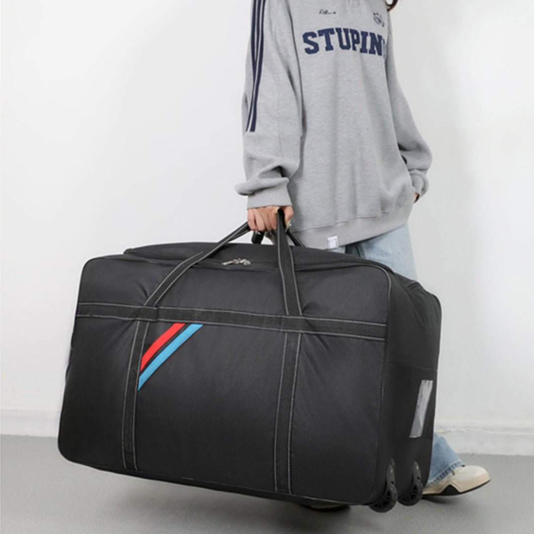 Spacious travel bag with lightweight wheels and reinforced carrying handle Kalsten