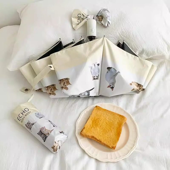Ladies folding umbrella with playful animal design Kalsten