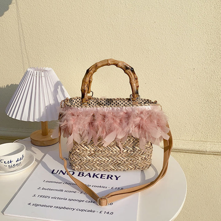 Elegant handbag with feathers and bamboo handles Kalsten