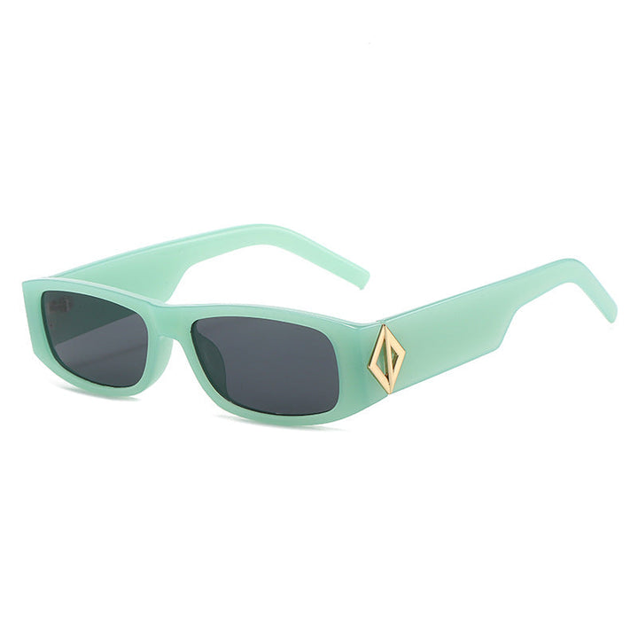 Ladies fashionable sunglasses with asymmetrical frame and gold-colored details Kalsten