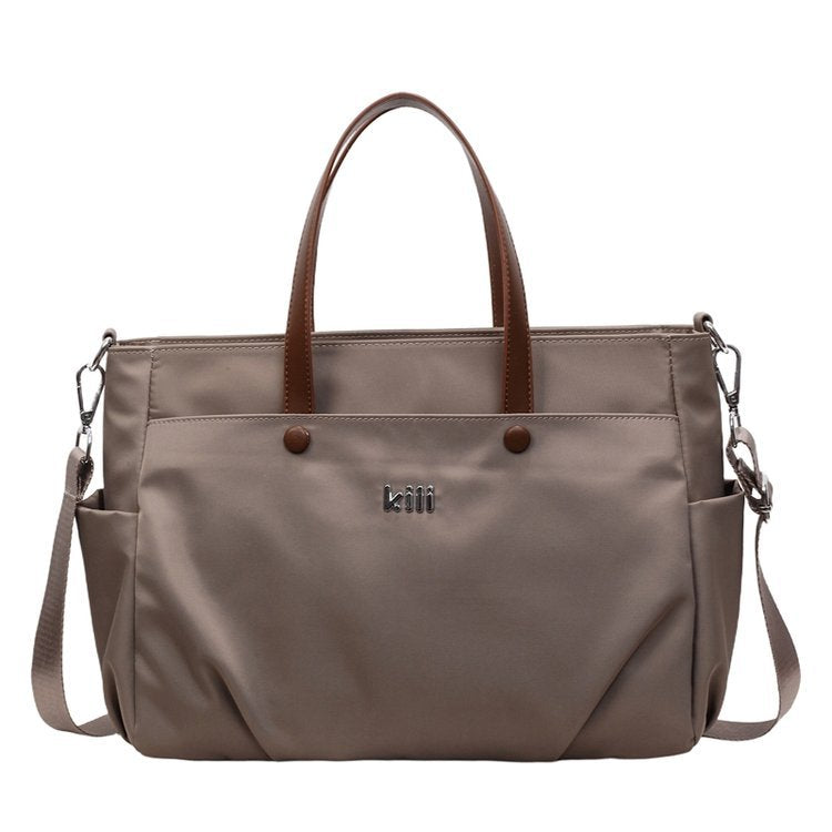 Shopping bag with comfortable carrying system and practical outer pockets Kalsten