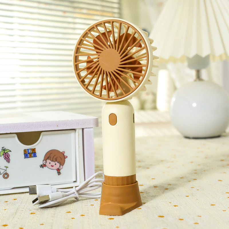 Portable hand fan with ergonomic grip and USB charging function Kalsten