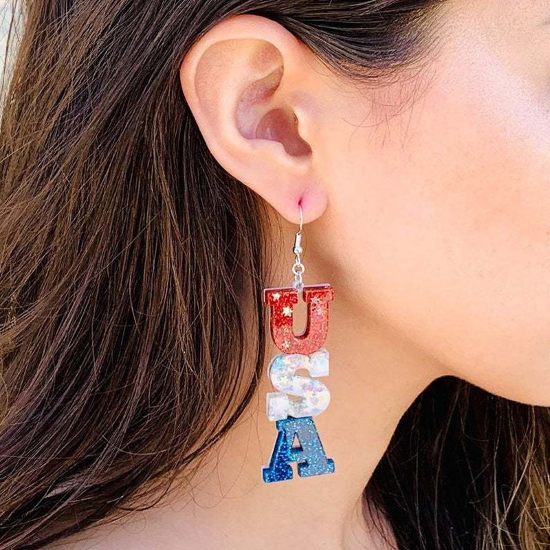 Women’s letter earrings made of resin with glitter effect and pendants Kalsten