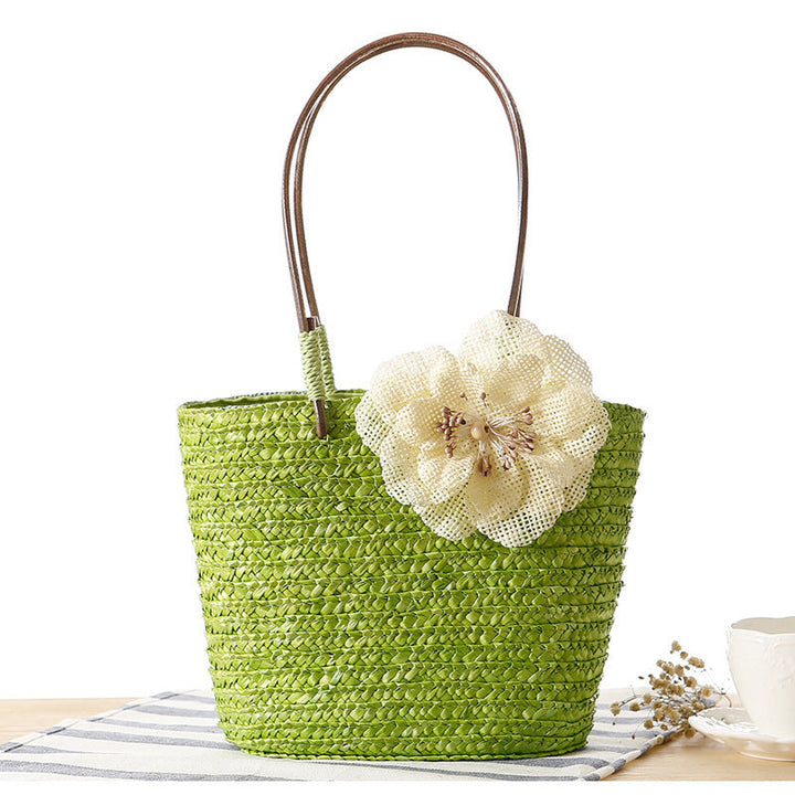 Elegant bast bag with flower appliqué Kalsten