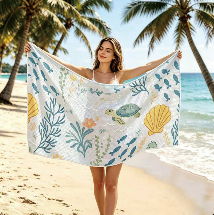 Beach towel with floral design Kalsten