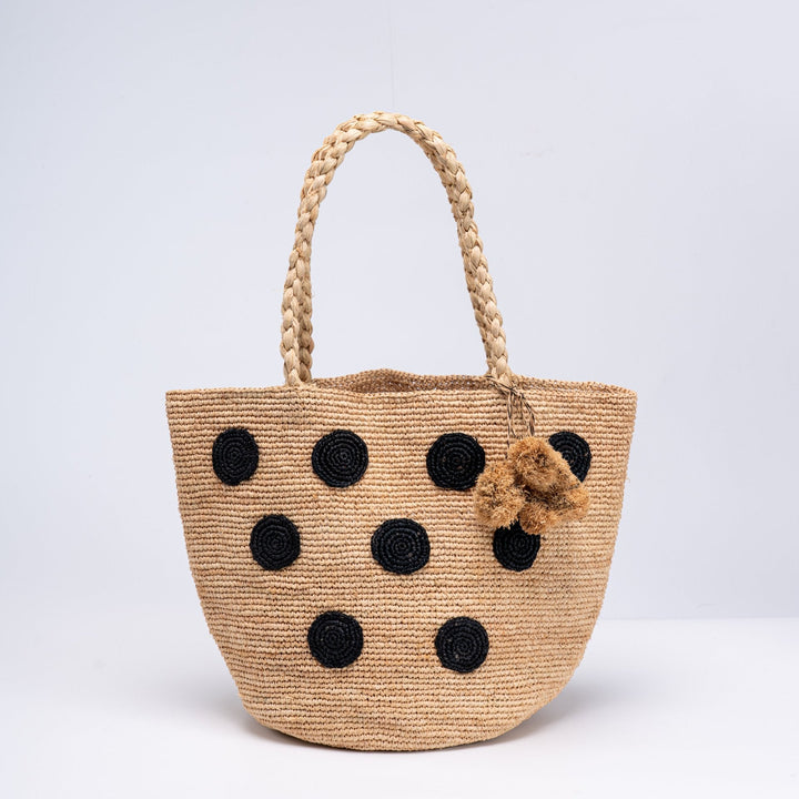 Handcrafted straw bag with eye-catching accents Kalsten