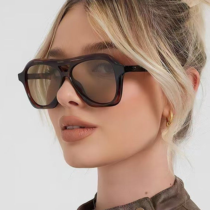 Ladies fashionable sunglasses in innovative design with wide frame Kalsten
