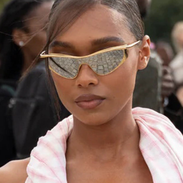 Ladies extravagant shaped sunglasses with protective UV filter Kalsten