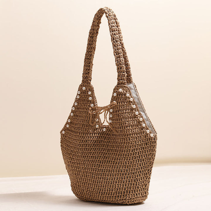 Handbag with pearl decor and innovative closure Kalsten