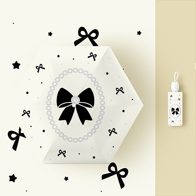 Ladies' kid-friendly folding umbrella with fun rabbit design Kalsten
