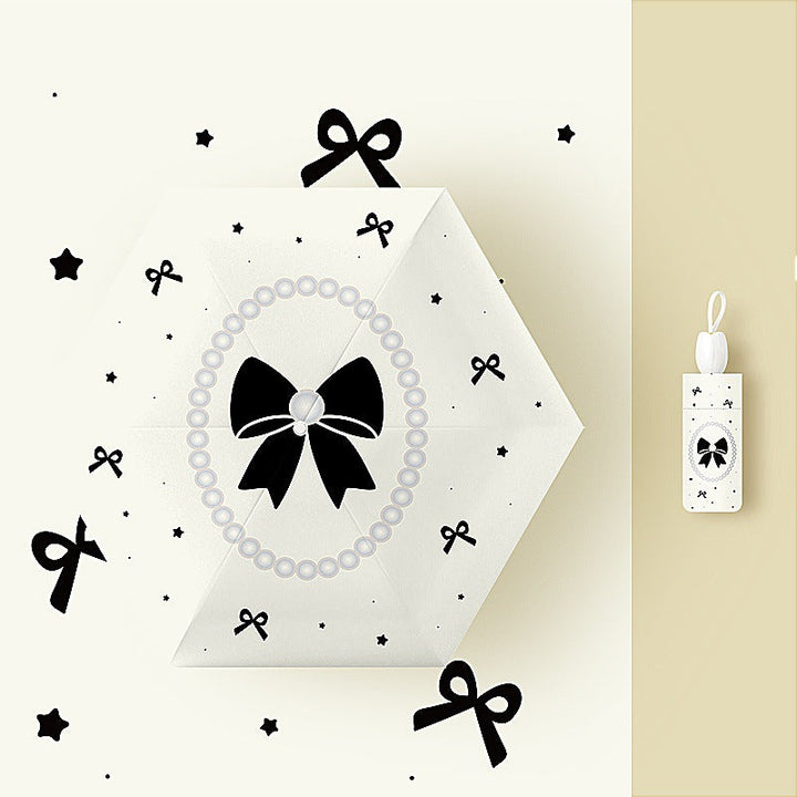 Ladies' kid-friendly folding umbrella with fun rabbit design Kalsten
