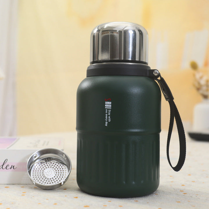 Insulated thermos bottle with practical drinking cup and sturdy carrying strap Kalsten