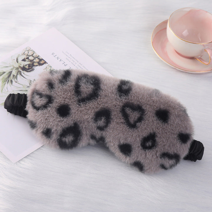 Women's cuddly faux fur sleep mask with heart-embossed surface and gathered comfort band Kalsten