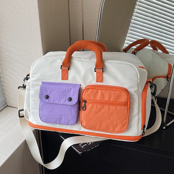 Sporty travel bag with multifunctional outer pockets Kalsten