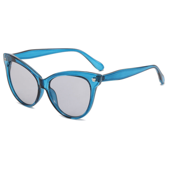 Ladies trendy cat-eye sunglasses with transparent frame and blue lenses Kalsten