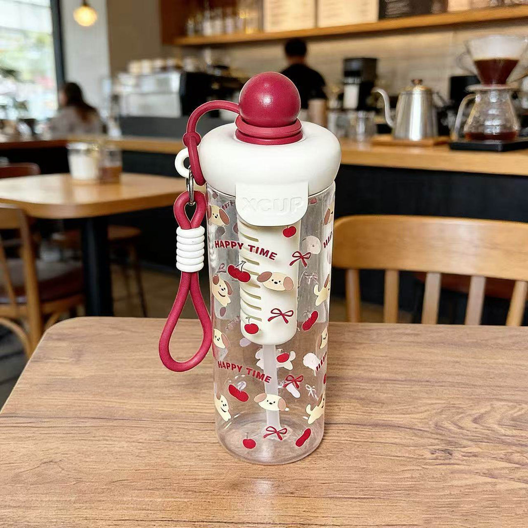 Women's water bottle with cheerful design and practical carrying handle Kalsten