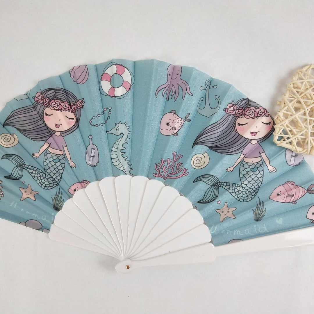 Women folding hand fan with shimmering scale pattern Kalsten