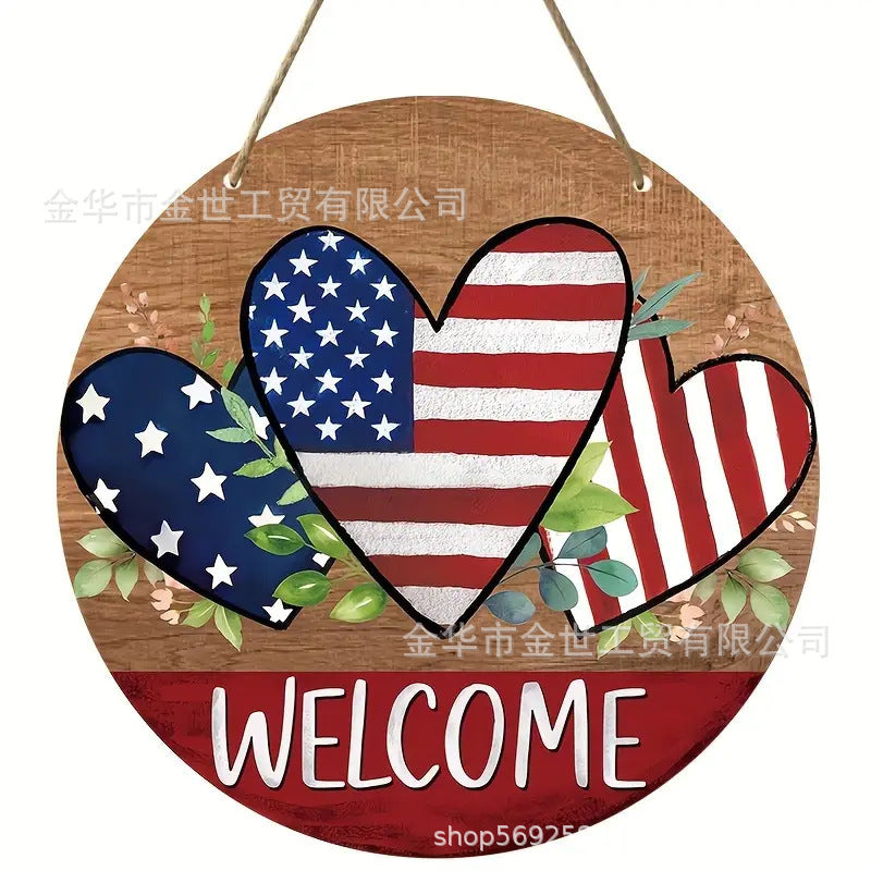 Independence Day rustic round wooden patriotic cross wall plaque with floral accents and God Bless America banner Kalsten
