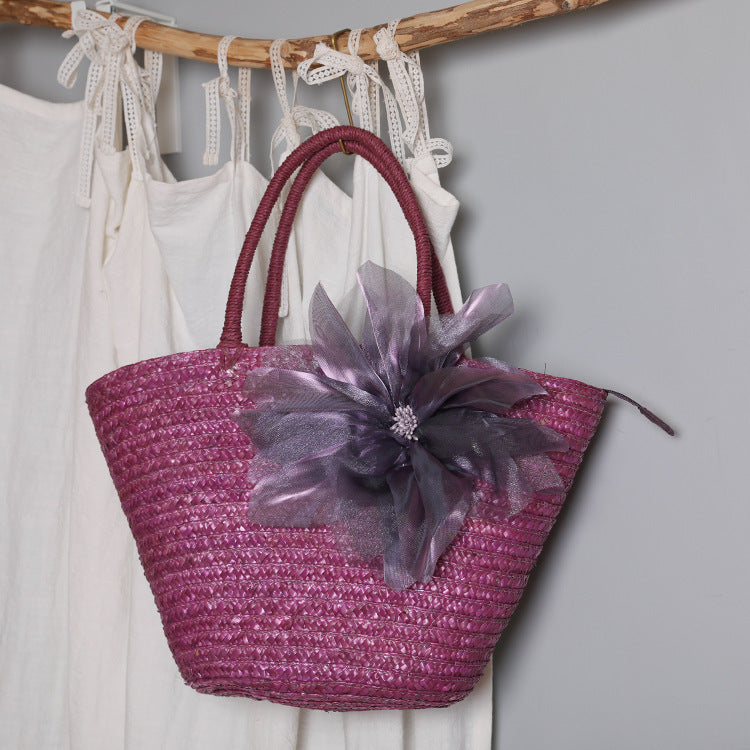 Stylish basket bag with eye-catching flower detail Kalsten