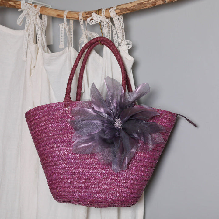 Stylish basket bag with eye-catching flower detail Kalsten