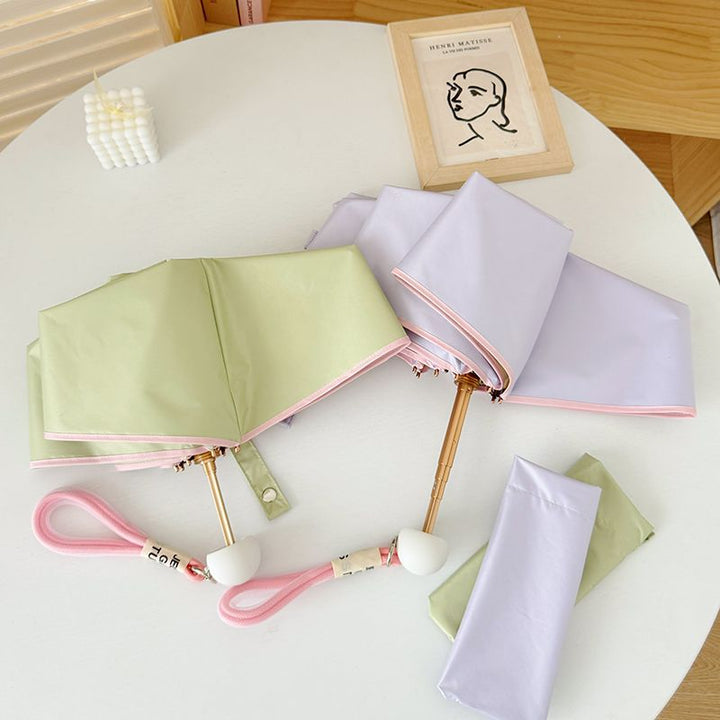 Ladies compact folding umbrella with practical handbag loop Kalsten