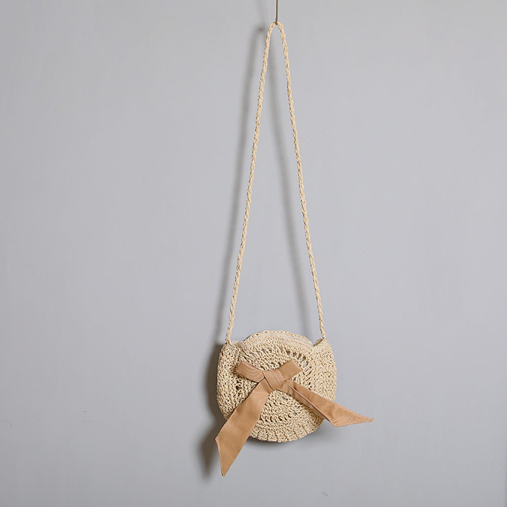 Handwoven shoulder bag with decorative bow accent Kalsten