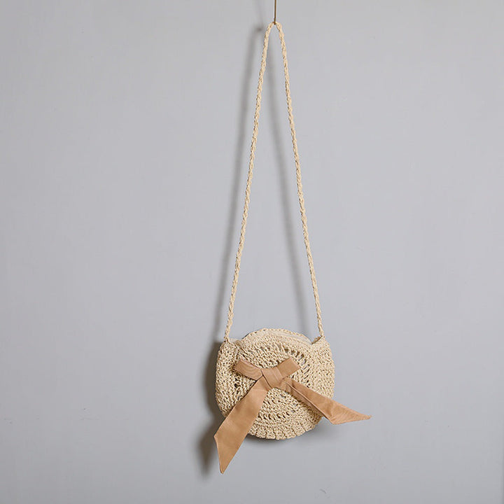Handwoven shoulder bag with decorative bow accent Kalsten