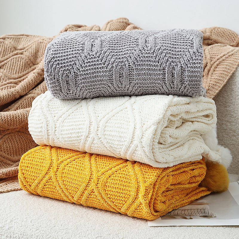 Ladies knit blanket with decorative pom poms Kalsten