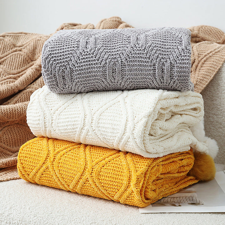 Ladies knit blanket with decorative pom poms Kalsten