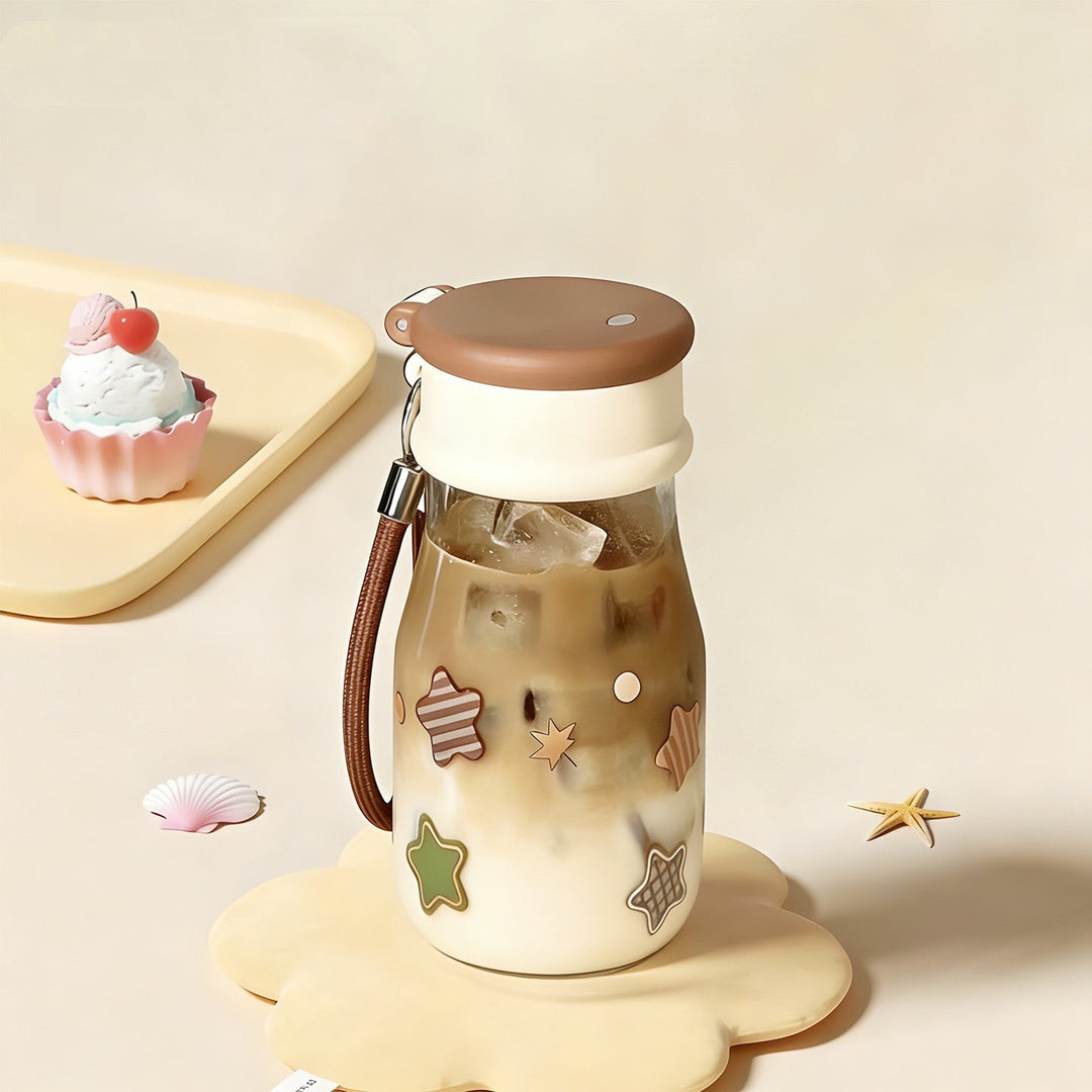 Ladies drinking bottle with playful print and practical carrying handle Kalsten