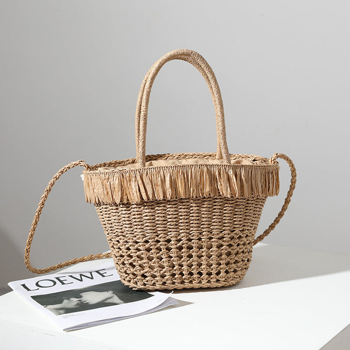 Braided straw bag with decorative tassel detail Kalsten