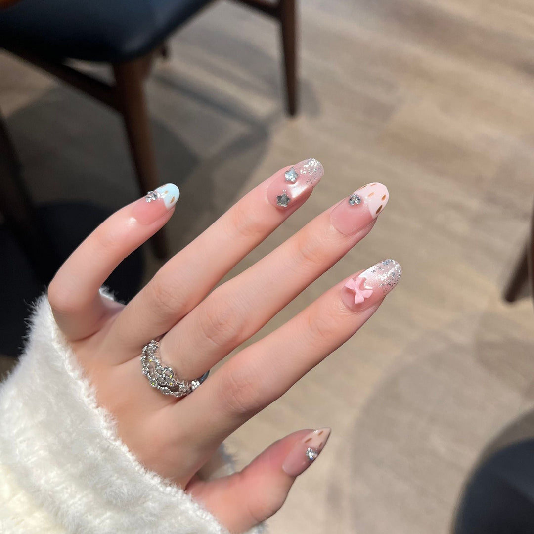 Decorative Press-On Nail Art with Bow and Gem Accents Kalsten
