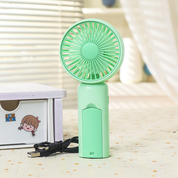 Women portable mini hand fan with USB charging function and ergonomic design Kalsten