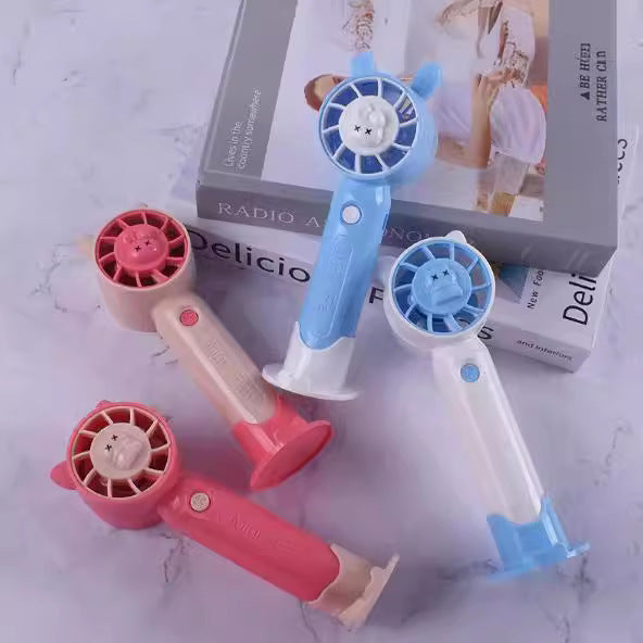Unisex nan portable rechargeable handheld desk fan with silicone suction base and quiet brushless motor Kalsten