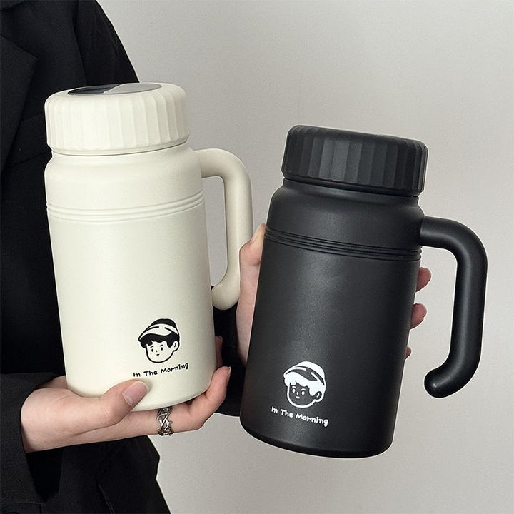 Women’s insulated carafe with ergonomic carrying handle and innovative closure system Kalsten