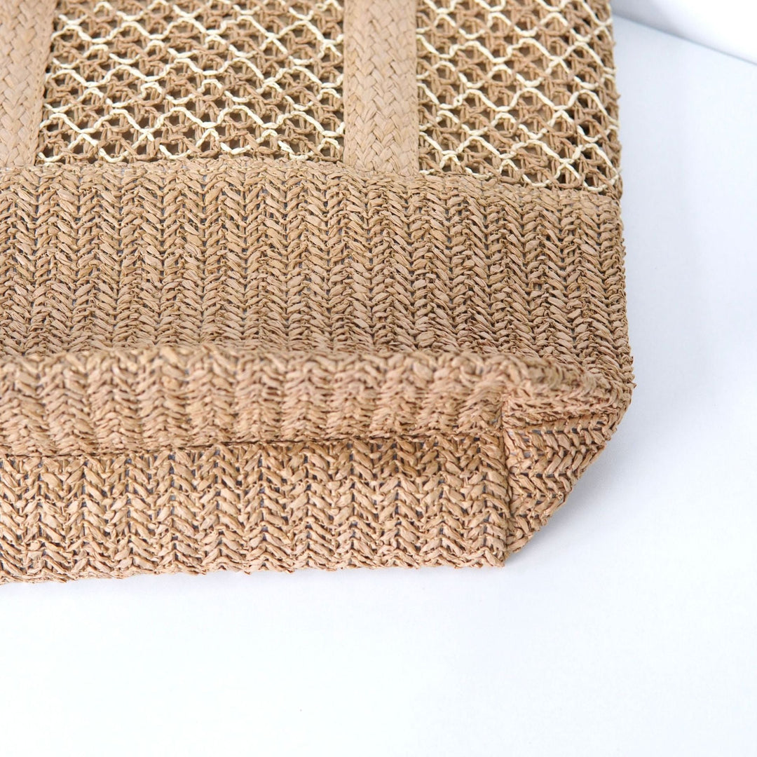 Beach bag with mesh structure and tassel details Kalsten