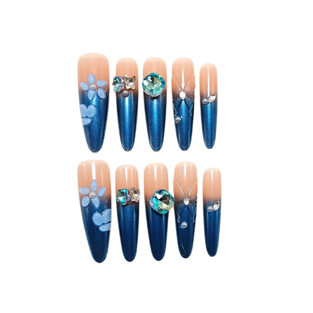 Artificial nails in elegant design with artistic decorations and glitter accents Kalsten