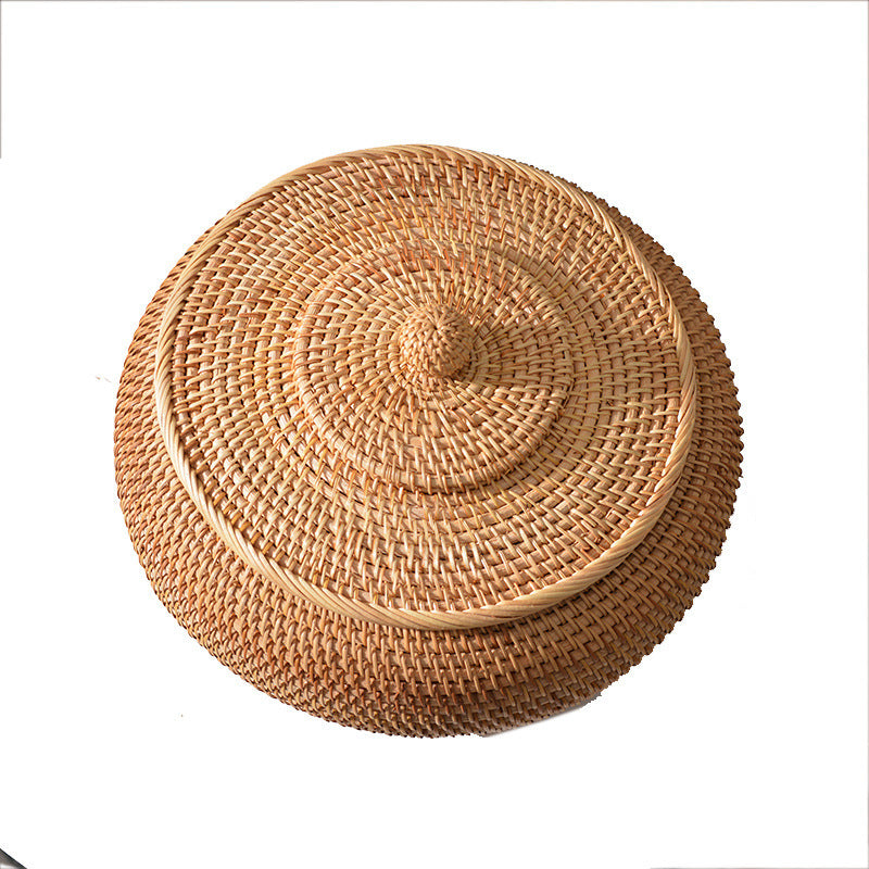 Women's round storage basket made of woven natural material Kalsten