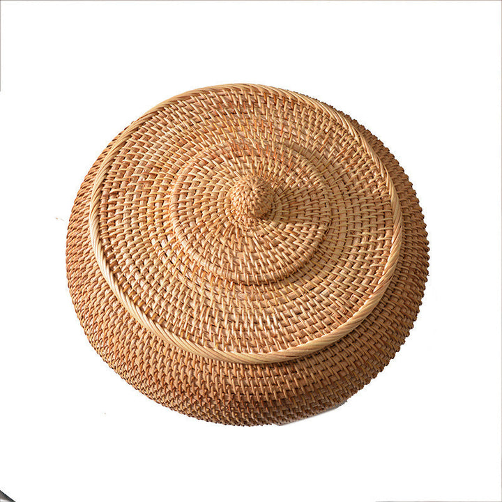 Women's round storage basket made of woven natural material Kalsten