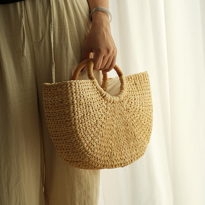Handmade beach bag made of braided rattan Acalora