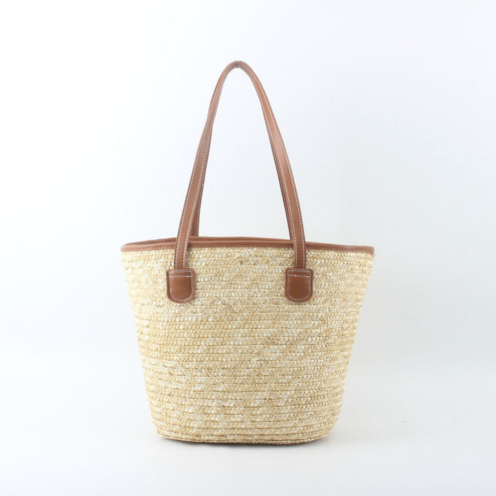 Braided basket bag with elegant leather handles Kalsten