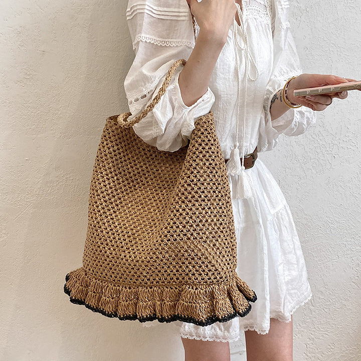 Handcrafted straw bag with fringed hem Kalsten