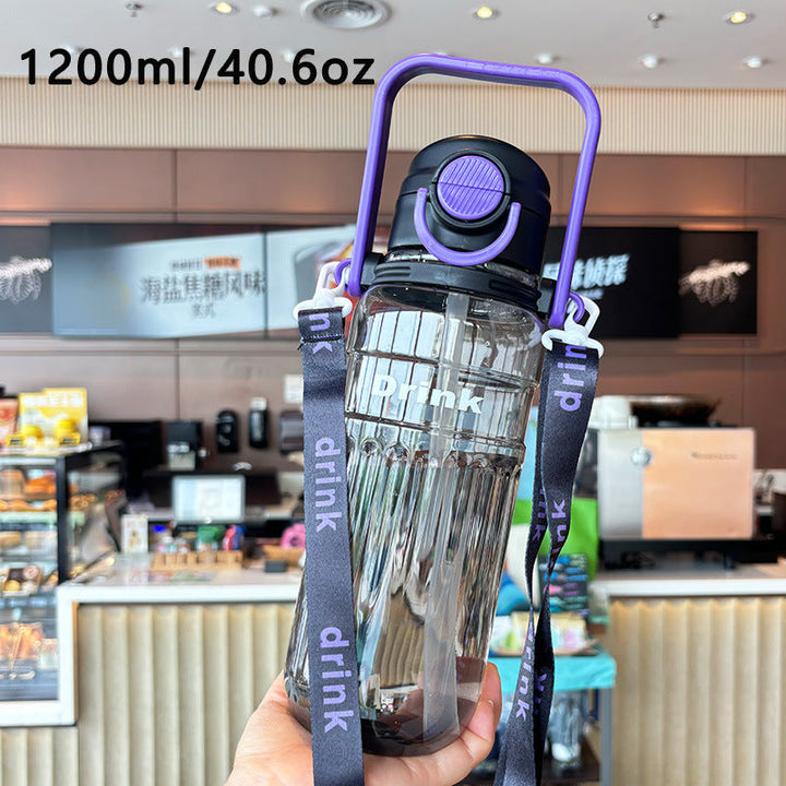 Women's large transparent drinking bottle with integrated carrying handle Kalsten